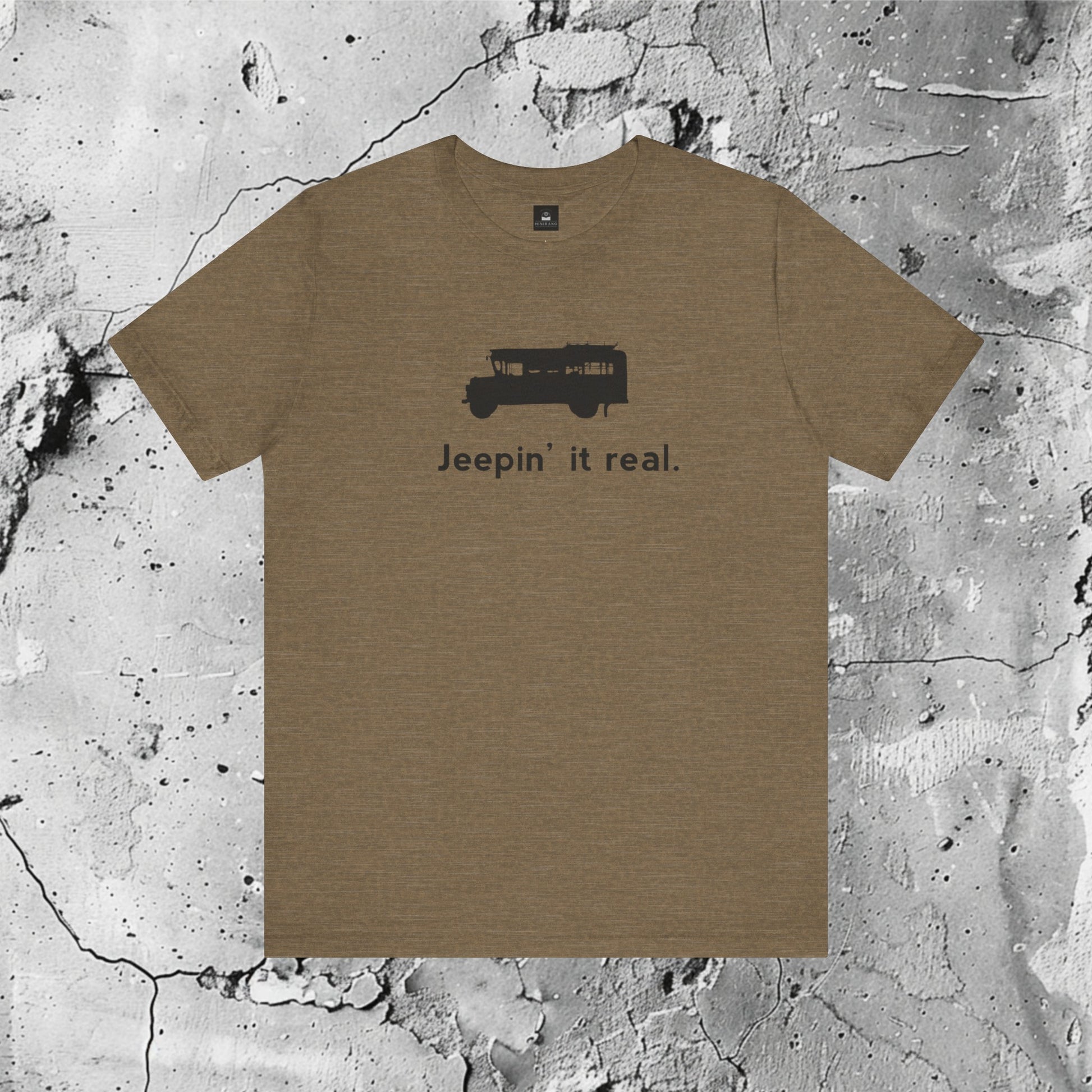 Jeepin' It Real (B) | Graphic T-Shirt | Modern Filipino Clothing | HINIRANG. Elevate your style with our graphic t-shirt from Filipino clothing brand, Hinirang. This unisex classic fit features short sleeves, soft cotton, and a ribbed-knit collar. A cultural icon that embodies Filipino identity, values, and creativity. Wear the Philippine jeepney with pride!