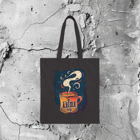 Kalma Lang Cotton Canvas Tote Bag | Filipino Canvas Bag | HINIRANG. Discover the versatile Philippine tote bag by HINIRANG. Made from durable cotton canvas, this stylish hanging tote is perfect for everyday use. Ideal for shopping, beach trips, or as a chic accessory, it combines practicality with a touch of Filipino flair.