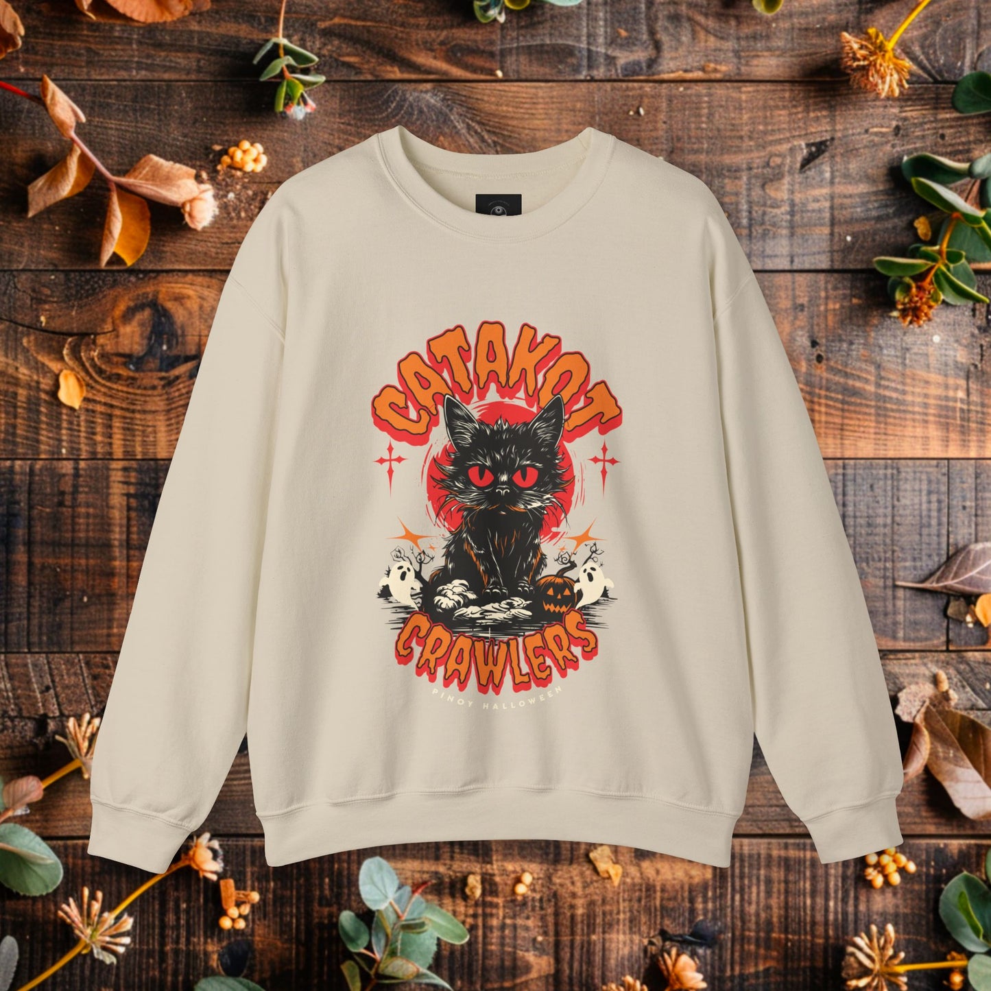 CATakot Crawlers Crewneck Sweatshirt | Modern Filipino Clothing | HINIRANG. Stay cozy and spooky with the 'CATakot Crawlers' crewneck sweatshirt from Hinirang, a Filipino clothing brand known for mixing playful designs with cultural pride. Perfect for Halloween or any chilly day, this sweatshirt offers both comfort and a fun, creepy-crawly twist to your wardrobe.