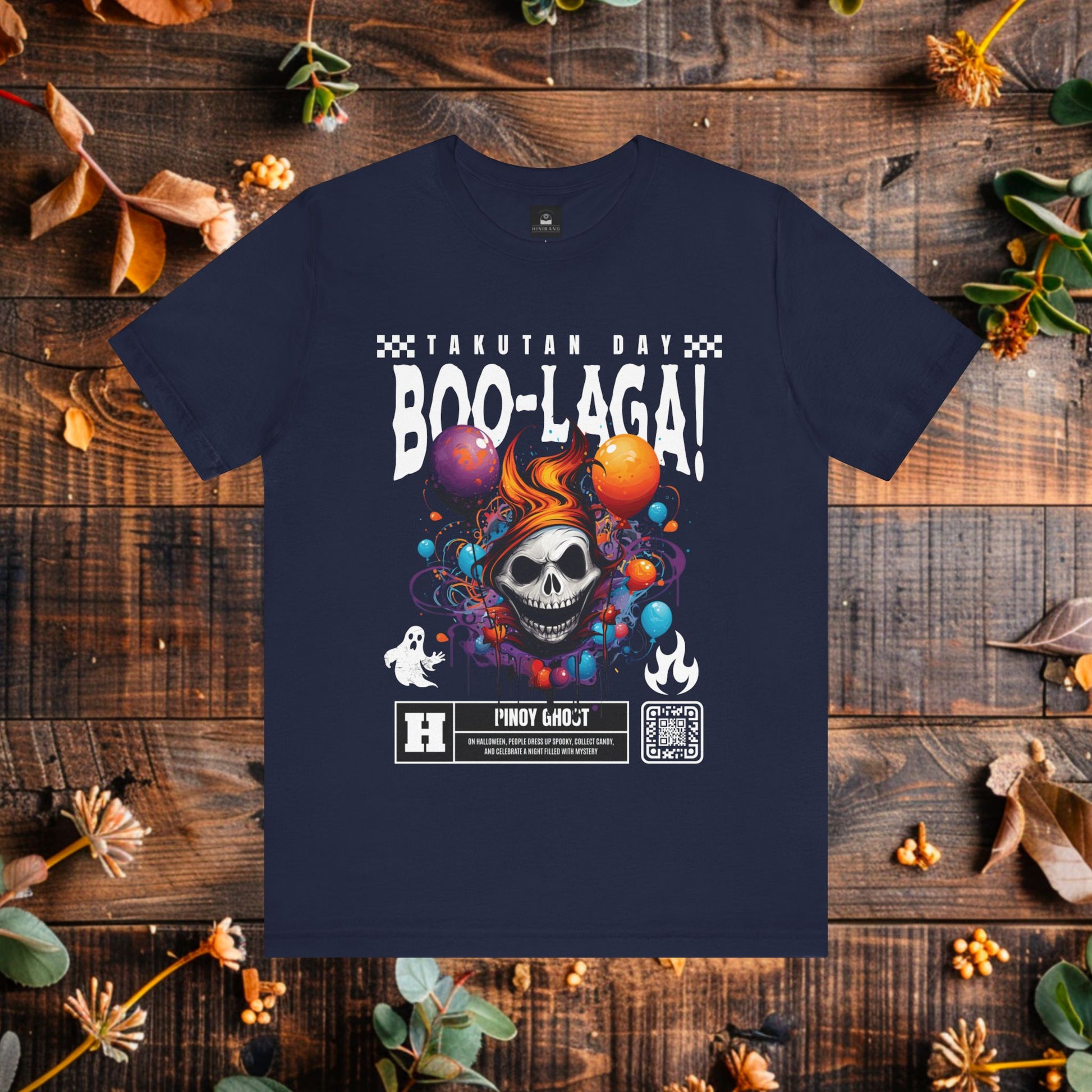 BOO-laga! Graphic T-Shirt | Modern Filipino Clothing | HINIRANG. Get ready for some spooky fun with the 'BOO-laga!' t-shirt from Hinirang, a Filipino clothing brand that brings playful designs to life. This Halloween-inspired shirt is perfect for adding a touch of humor and Filipino culture to your festive wardrobe.