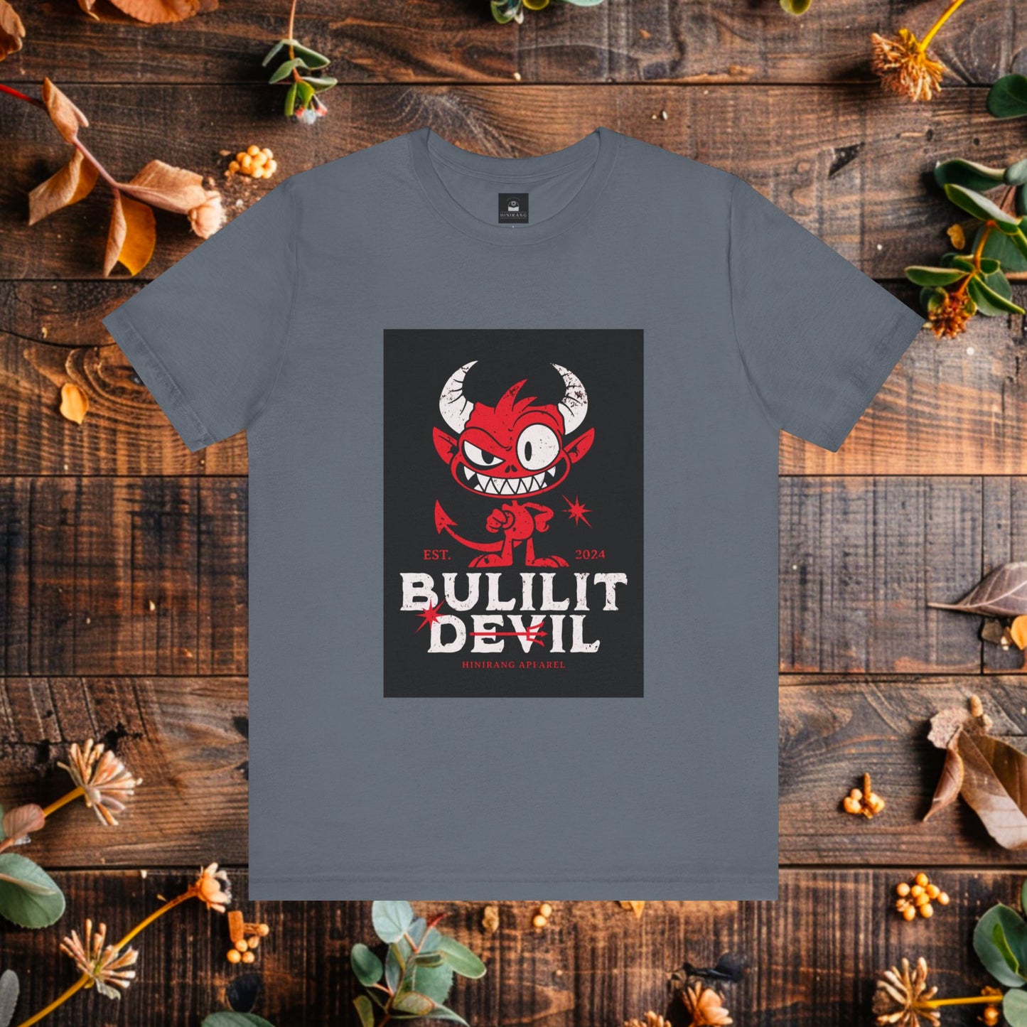 Bulilit Devil Graphic T-Shirt | Filipino Clothing Brand | HINIRANG. Unleash your playful side with the 'Bulilit Devil' t-shirt from Hinirang, a standout piece of modern Filipino clothing. Perfect for the Halloween season or any time you want to add a bit of mischief to your style, this shirt combines comfort and fun with a touch of Filipino flair.